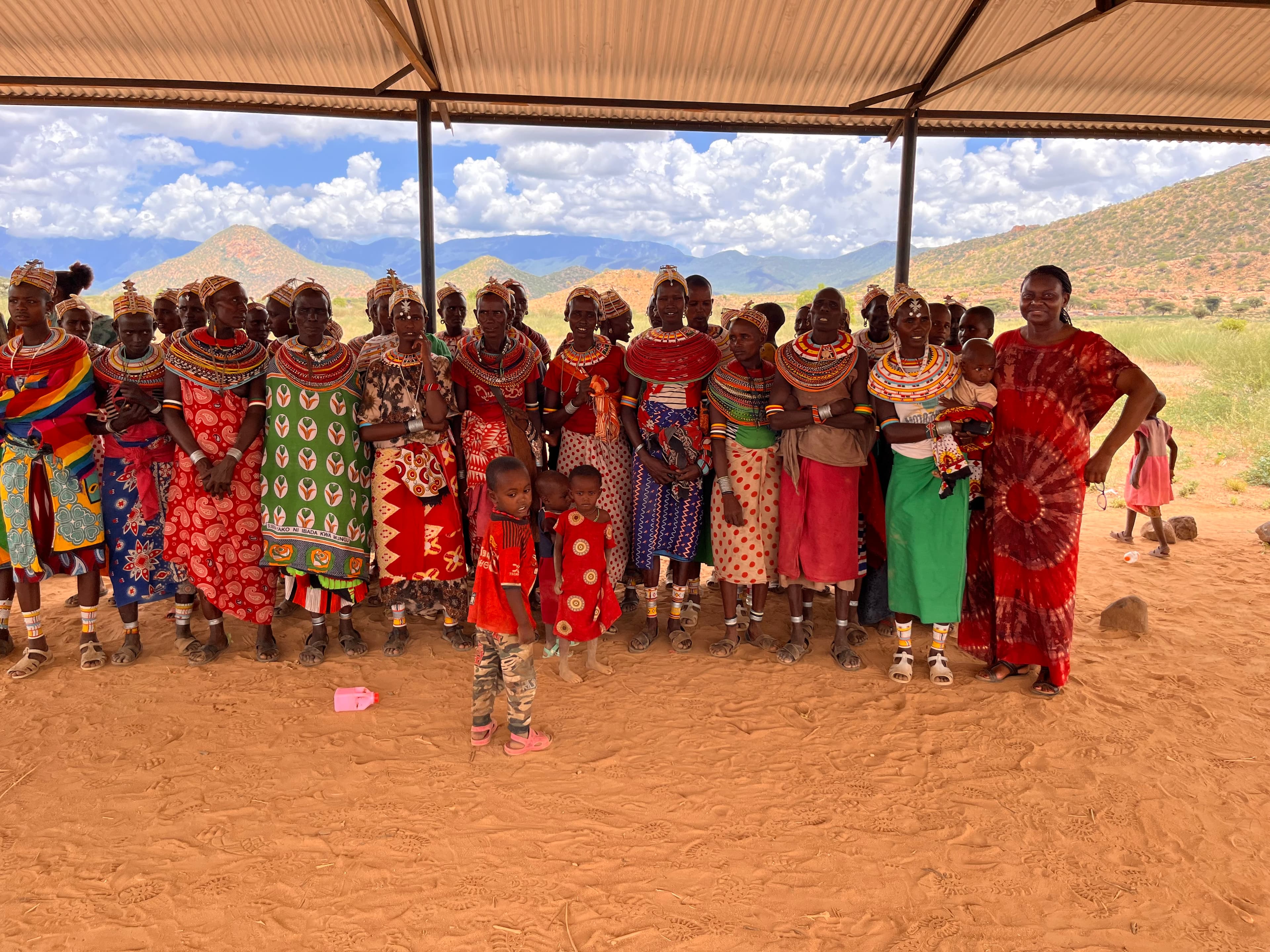 Community members listening to an audio Bible